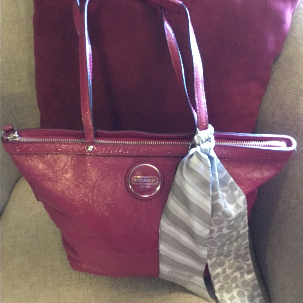 Beautiful rich pink Coach tote with stylish scarf